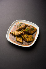 Patodi Rassa Bhaji or patwadi Sabji, a popular Maharashtrian spicy recipe served with Chapati and salad. Selective focus