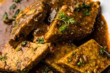 Patodi Rassa Bhaji or patwadi Sabji, a popular Maharashtrian spicy recipe served with Chapati and salad. Selective focus