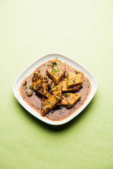 Patodi Rassa Bhaji or patwadi Sabji, a popular Maharashtrian spicy recipe served with Chapati and salad. Selective focus