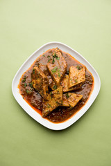 Patodi Rassa Bhaji or patwadi Sabji, a popular Maharashtrian spicy recipe served with Chapati and salad. Selective focus