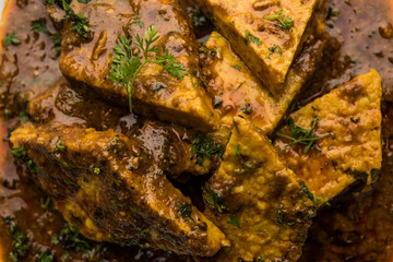 Patodi Rassa Bhaji or patwadi Sabji, a popular Maharashtrian spicy recipe served with Chapati and salad. Selective focus