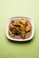 Patodi Rassa Bhaji or patwadi Sabji, a popular Maharashtrian spicy recipe served with Chapati and salad. Selective focus