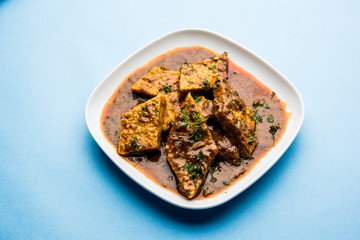 Patodi Rassa Bhaji or patwadi Sabji, a popular Maharashtrian spicy recipe served with Chapati and salad. Selective focus