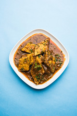 Patodi Rassa Bhaji or patwadi Sabji, a popular Maharashtrian spicy recipe served with Chapati and salad. Selective focus