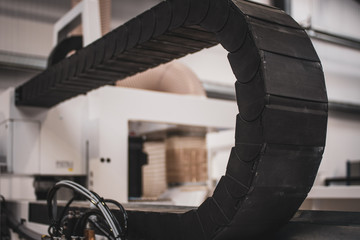 Moving rubber part of a generic heavy manufacturing machine. 