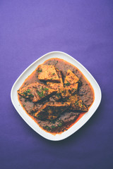 Patodi Rassa Bhaji or patwadi Sabji, a popular Maharashtrian spicy recipe served with Chapati and salad. Selective focus