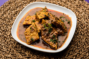 Patodi Rassa Bhaji or patwadi Sabji, a popular Maharashtrian spicy recipe served with Chapati and salad. Selective focus