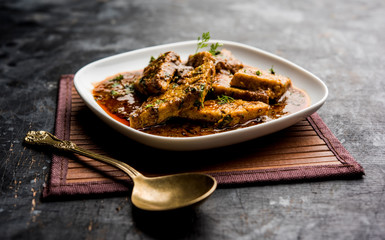 Patodi Rassa Bhaji or patwadi Sabji, a popular Maharashtrian spicy recipe served with Chapati and salad. Selective focus