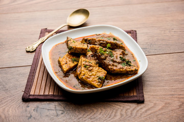 Patodi Rassa Bhaji or patwadi Sabji, a popular Maharashtrian spicy recipe served with Chapati and salad. Selective focus