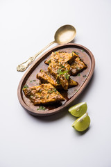 Patodi Rassa Bhaji or patwadi Sabji, a popular Maharashtrian spicy recipe served with Chapati and salad. Selective focus