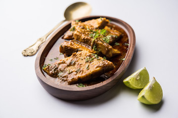 Patodi Rassa Bhaji or patwadi Sabji, a popular Maharashtrian spicy recipe served with Chapati and salad. Selective focus