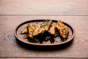 Patodi Rassa Bhaji or patwadi Sabji, a popular Maharashtrian spicy recipe served with Chapati and salad. Selective focus