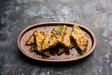 Patodi Rassa Bhaji or patwadi Sabji, a popular Maharashtrian spicy recipe served with Chapati and salad. Selective focus