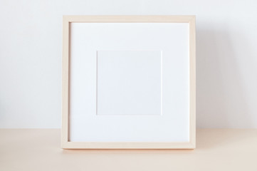 Wooden Square Frame with Poster Mockup.