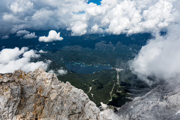 Panoramic view of Eibsee lake from Zugspitze, the highest mountain of the Bavarian Alps, home to three glaciers and Germany's highest ski resort.