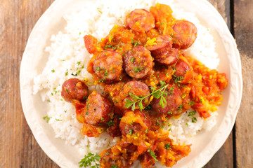 sausage with spicy sauce and rice