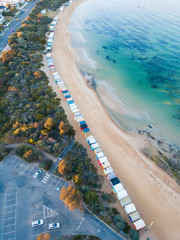 Aerial view of beach hut along Brighton Beach coastline, Melbourne, Australia.
