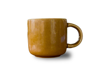 A cup of coffee on wooden table over nature background.