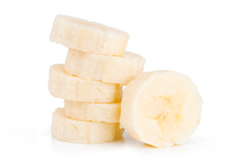 Stack pile of banana slices isolated on the white background