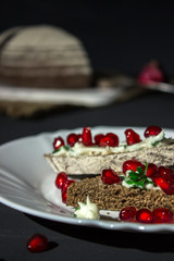 sandwich with cheese, greens and pomegranate berries