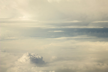 white clouds against the background of an impending thunderstorm view from a height. heavy sky