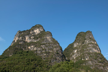 Fototapeta na wymiar Karst mountains and limestone peaks of Yulong River, Yangshuo, Guilin, China, time lapse