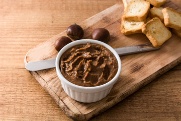 Chestnut cream on bowl rusty table