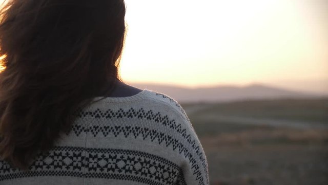 Portrait Of An Attractive Middle-aged Woman In The Sunset View From Back Sun Rays Play In Hair