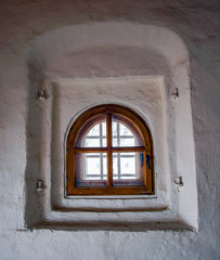 An ancient window with a portal.