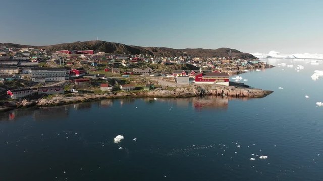 4k Greenland Aerial view of Ilulissat city along edge