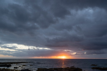 Obraz premium Scenic landscapes at sunset of the Punta del Hidalgo's lighthouse