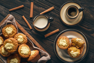 Pumpkin muffins with cream cheese stuffing.