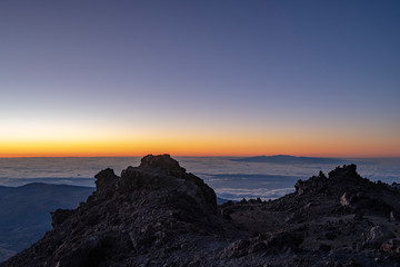 Fototapeta na wymiar Sun is rising over Canary Islands, seen from near the summit of Teide Mountain, Tenerife, Canary Islands, Spain
