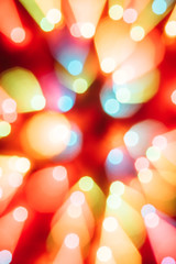 Christmas background with colourful Bokeh And Bright Lights