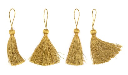 Golden silk tassels isolated on white background for creating graphic concepts - obrazy, fototapety, plakaty