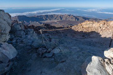 hikers reach the summit of Teide Mountain and enjoy the views from 3718 above sea level, Teide National Park, Tenerife, Canary Islands, Spain