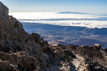 Fototapeta na wymiar hikers reach the summit of Teide Mountain and enjoy the views from 3718 above sea level, Teide National Park, Tenerife, Canary Islands, Spain