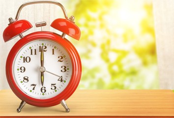 Retro alarm clock on   background