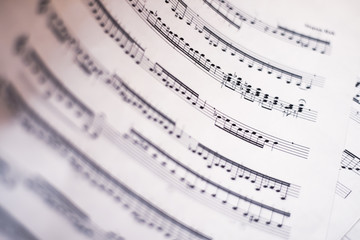 Fototapeta premium Music notes on paper, musical background