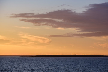red saturated colors in sunset over the sea