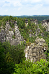 Fototapeta na wymiar Rock formations of the Elbe sandstone mountains around the Bastei bridge in Saxony, Germany