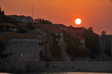 Sunset on the island of St. Stephen in Montenegro.