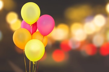 Bunch of colorful balloons on abstract background