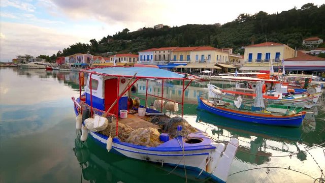 Colorful wooden fishing boats docked in Katakolon, Greece