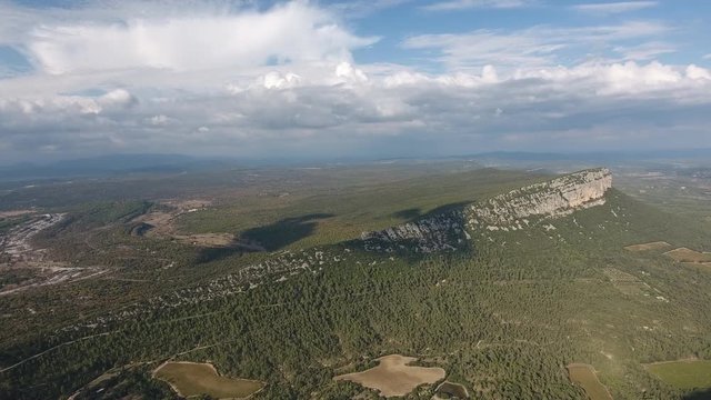 Garrigue arid landscape with mountains south of France by drone. Aerial view sunny day