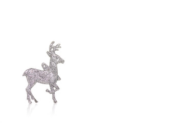 Christmas toy silver deer on a white background. Isolation