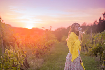 Young woman in vineyard