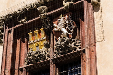 Coat of Arms of Prague and Czech republic on beautiful renaissance window of the Old Town Hall, Old Town Square, Prague, Czech Republic, UNESCO World Heritage Site, sunny day