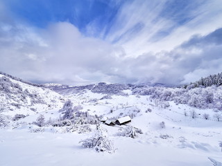 Fototapeta na wymiar beautiful winter mountain landscape, Fundatura Ponorului, Romania