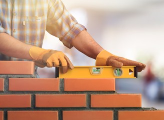 Handsome Professional plumber fixing pipes. Plumbing repair